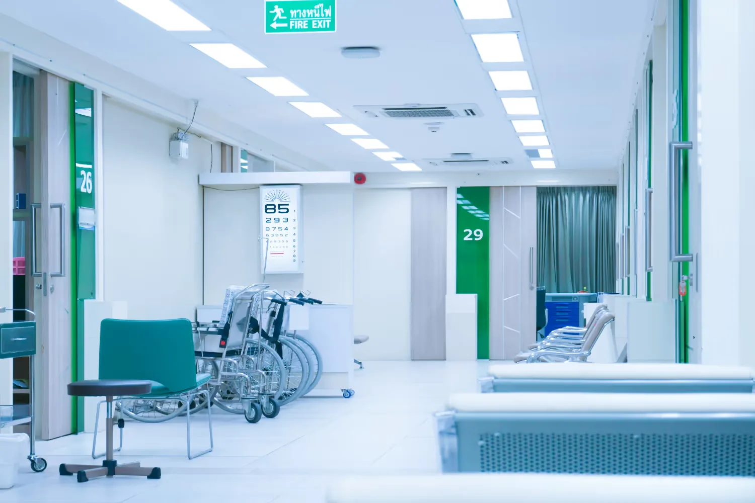 A hospital treatment room with patient chairs