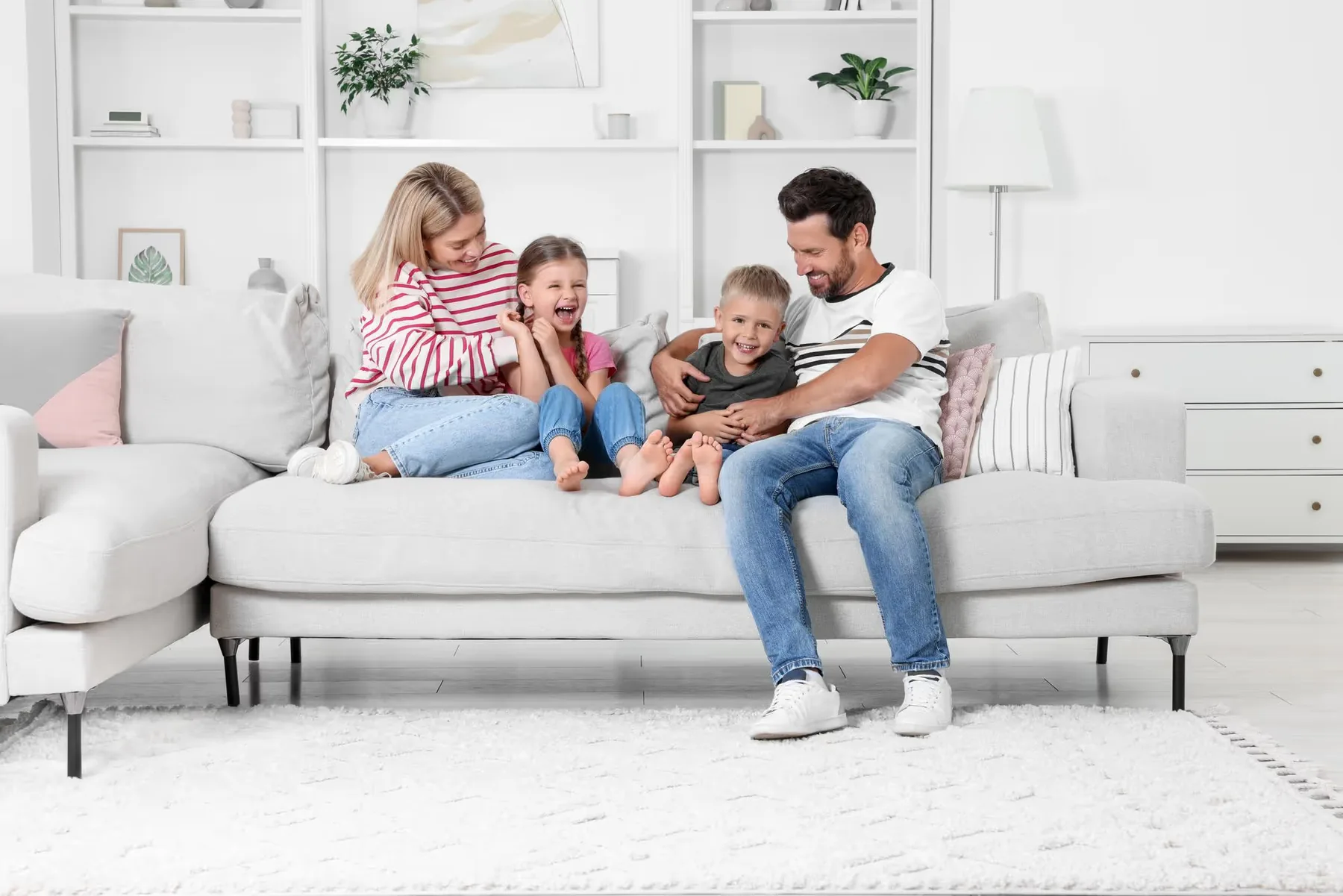 A family together in a bright living room