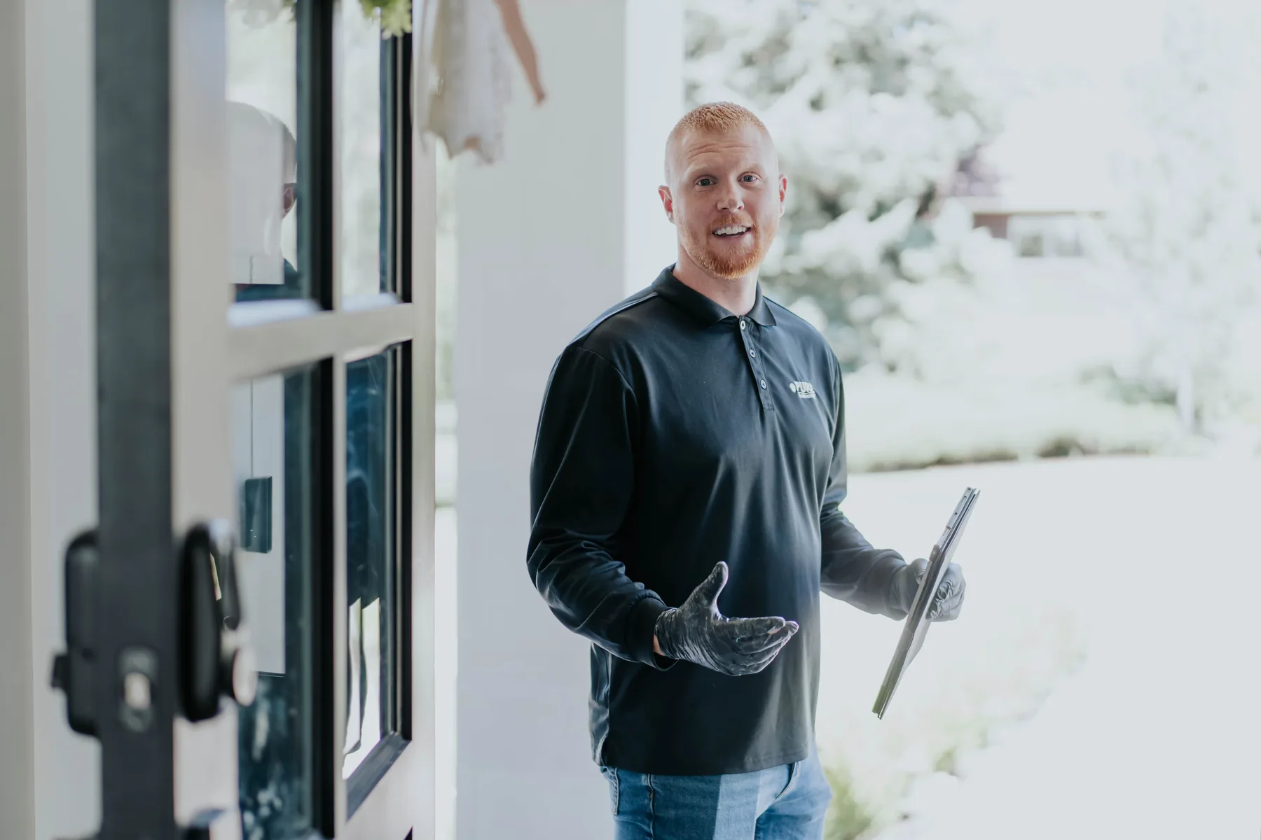 A technician standing in a doorway